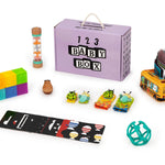 Collection of educational toys and a '123 Baby Box' on a white background