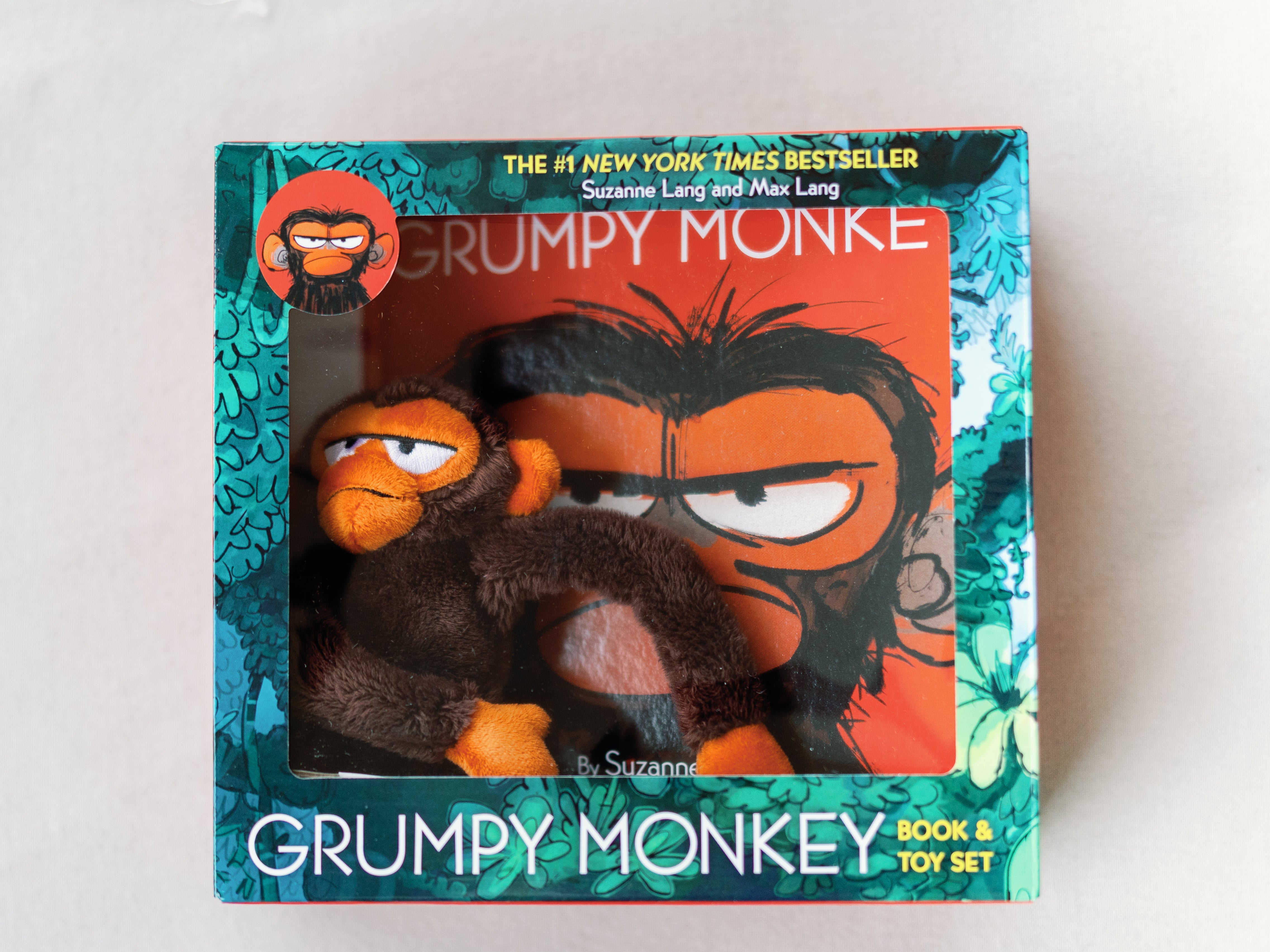 Grumpy Monkey book and plush toy gift set featuring the storybook and a soft Jim the Chimpanzee character doll in a gift-ready box