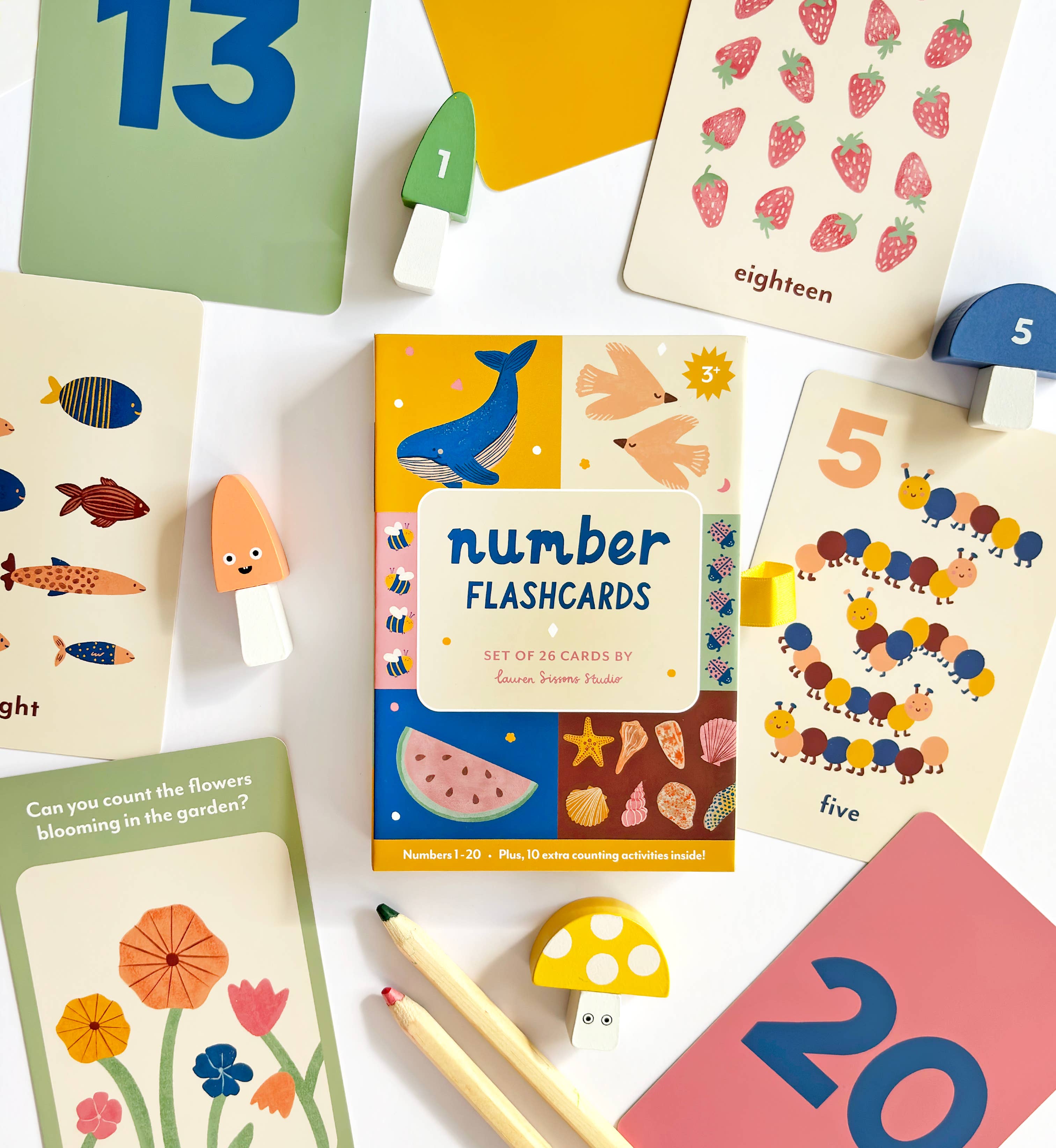 Illustrated number flashcards for kids with colorful numbers, nature artwork, counting prompts, and positive affirmations in a giftable box