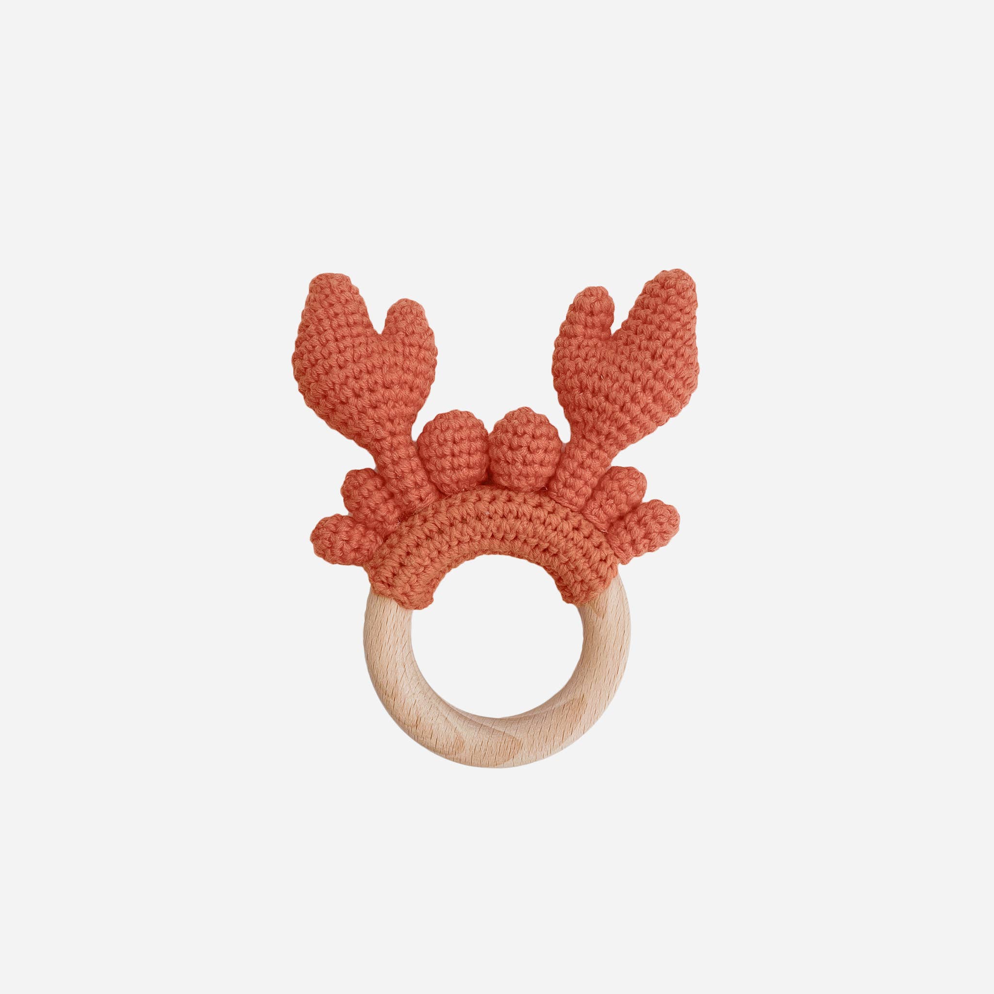 Crocheted cotton crab teether in red with soft rattle and baby-safe wooden ring by Blueberry Hill